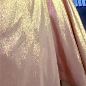 Boutique style prom dress worn once no rips tears or stains. ROSE GOLD/PINK